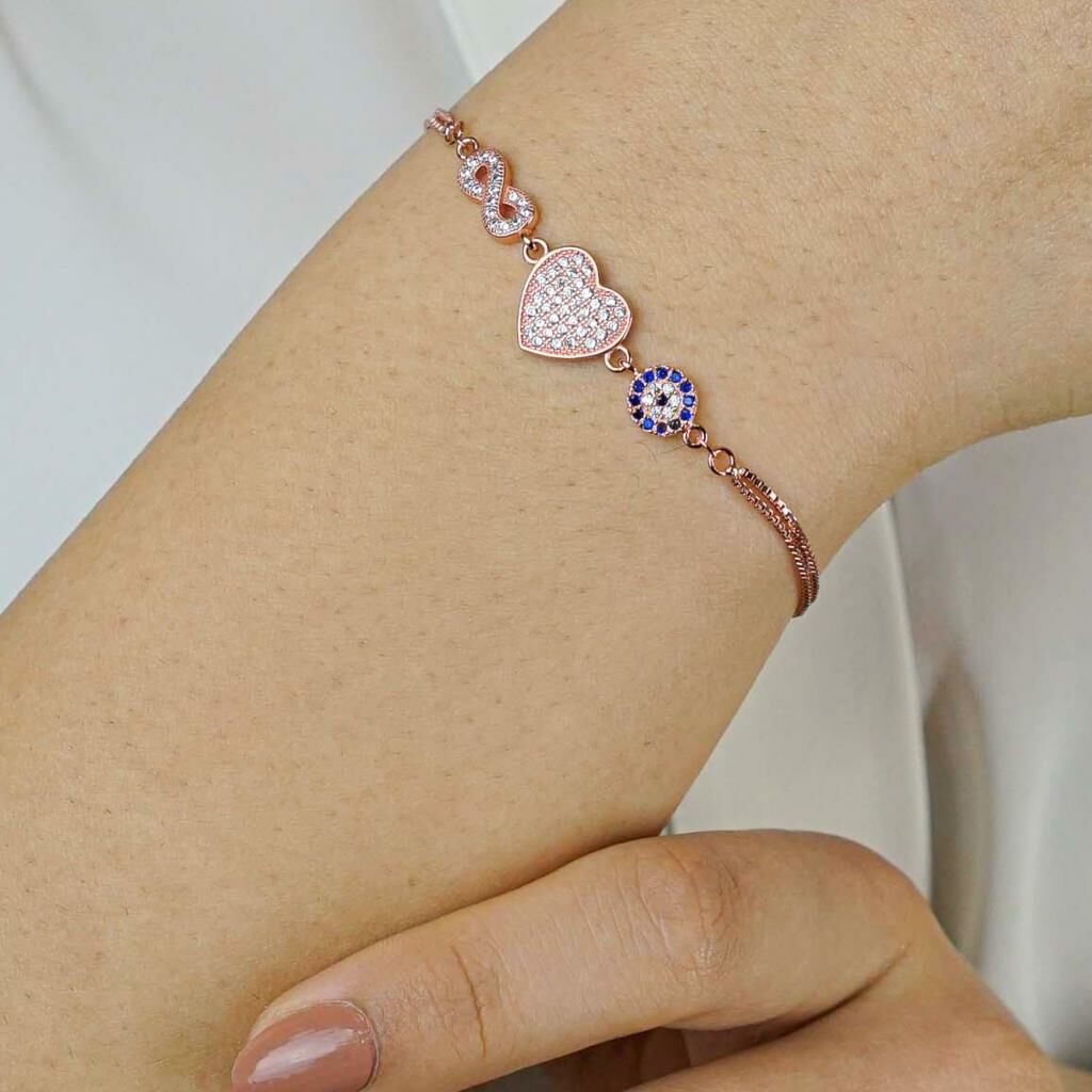 Sonsuzluk Kalp Nazar Tasarımlı Rose Renk 925 Ayar Gümüş Kadın Bileklik