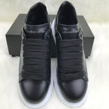 ALEXANDER McQueen %HAKİKİ DERİ ERKEK SNEAKER SİYAH BEYAZ