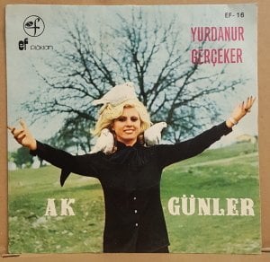 YURDANUR GERÇEKER - AK GÜNLER / KÜÇÜK YAŞTAN BERİ YÜZÜM GÜLMEDİ - 7'' 45 DEVİR KAPAKLI EF PLAKLARI 2.EL