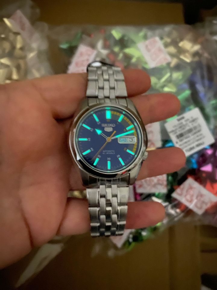 Seiko 5 SNK371K1 Otomatik  Çelik Gri Sarı,Mavi Kadran 39 mm Erkek Kol Saati