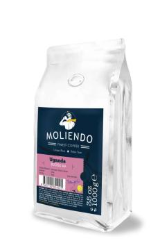 Moliendo Uganda Bugia to the local coffee