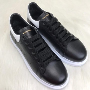 ALEXANDER McQueen %HAKİKİ DERİ ERKEK SNEAKER SİYAH BEYAZ