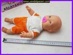 Şimşek Toys Ağlayan Emzikli  Bebek 33 cm x 15cm Ağlayan Emziği çıkarınca ağlama sesi gelir ( turuncu şapkası yoktur )