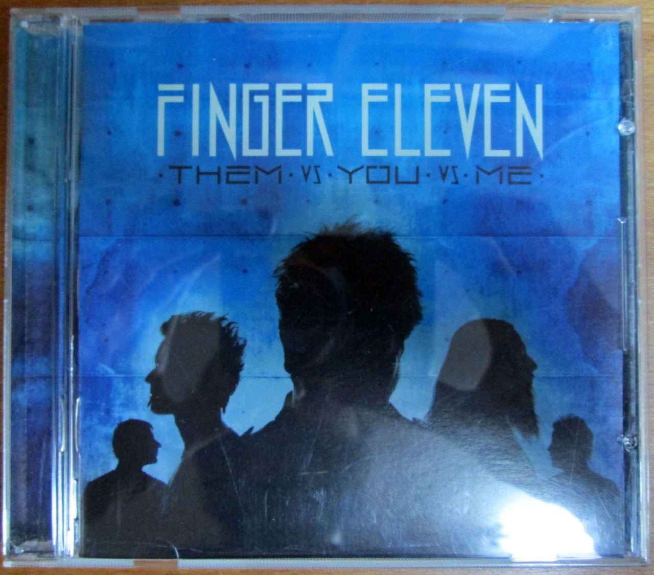 FINGER ELEVEN - THEM VS YOU VS ME (2007) - CD 2.EL