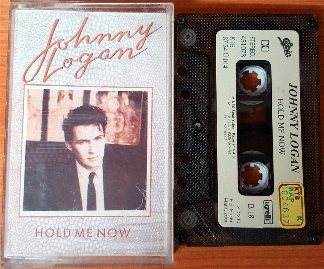 JOHNNY LOGAN - HOLD ME NOW (1987) UZELLI CASSETTE MADE IN TURKEY ''USED'' PAPER LABEL