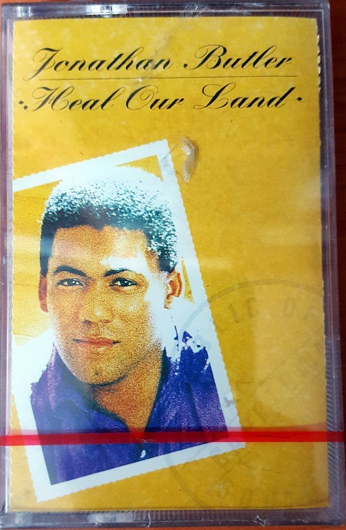 JONATHAN BUTLER - HEAL OUR LAND (1990) MMY CASSETTE MADE IN TURKEY ''NEW'' PAPER LABEL