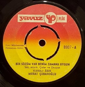 MURAT ÇOBANOĞLU - BİR SÖZÜM VAR BENİM ZAMANA UYGUN / BU GÖNLÜMÜN YARASINI SARAMADIM - 7'' 45 DEVİR KAPAKLI YAVUZ PLAK 2.EL