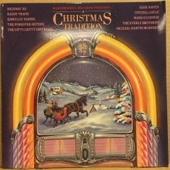 A CHRISTMAS TRADITION RANDY TRAVIS, EMMYLOU HARRIS, CRYSTAL GAYLE.. (1987) 2.EL PLAK
