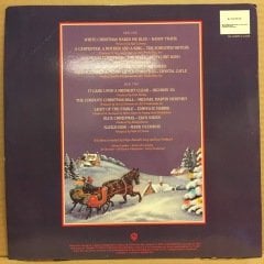 A CHRISTMAS TRADITION RANDY TRAVIS, EMMYLOU HARRIS, CRYSTAL GAYLE.. (1987) 2.EL PLAK