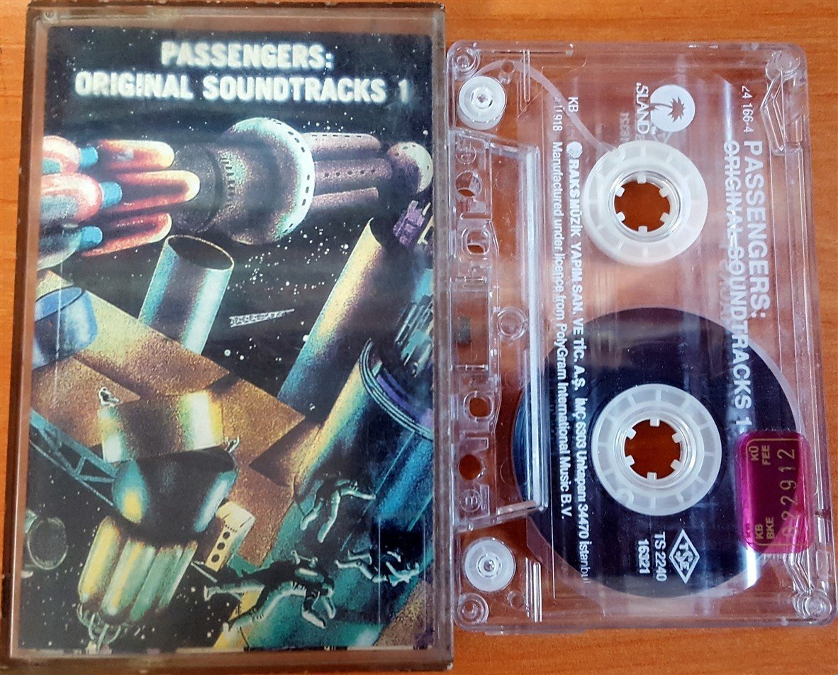 PASSENGERS: ORIGINAL SOUNDTRACKS 1 / BRIAN ENO, U2, HOWIE B, LUCIANO PAVAROTTI (1994) RAKS KASET 2.EL