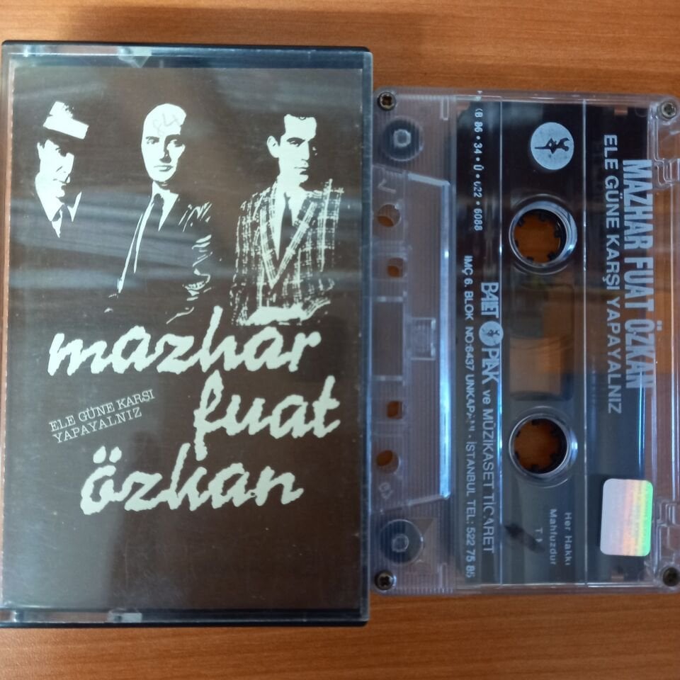 MAZHAR FUAT ÖZKAN - ELE GÜNE KARŞI YAPAYALNIZ (1986) - KASET 2.EL