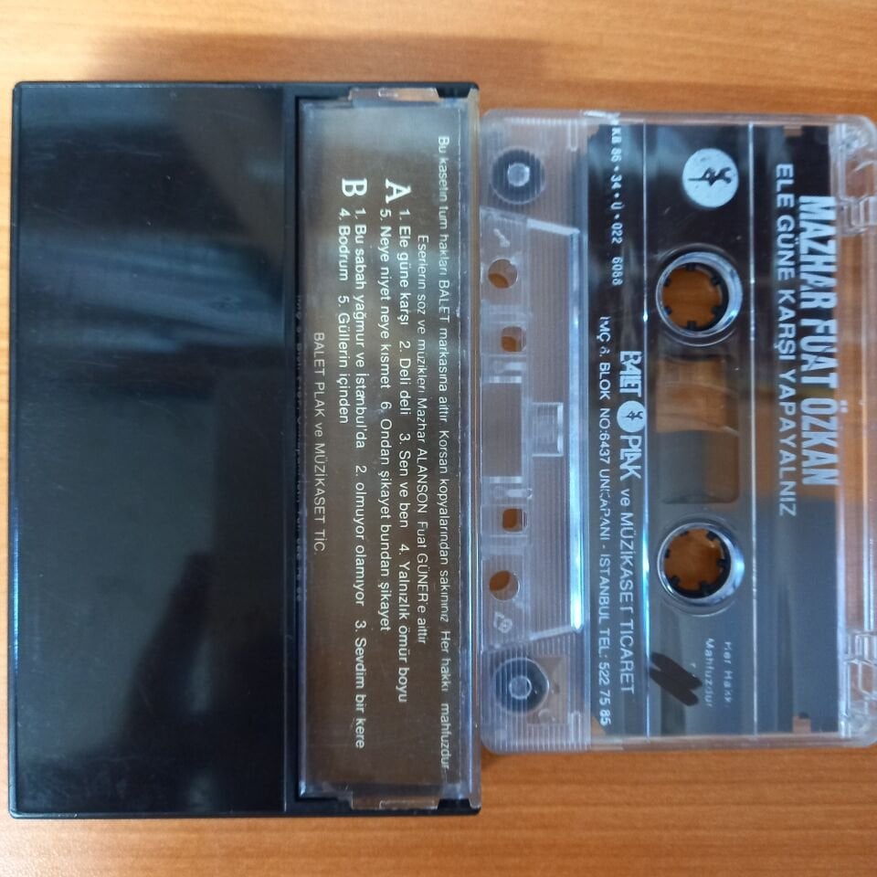 MAZHAR FUAT ÖZKAN - ELE GÜNE KARŞI YAPAYALNIZ (1986) - KASET 2.EL