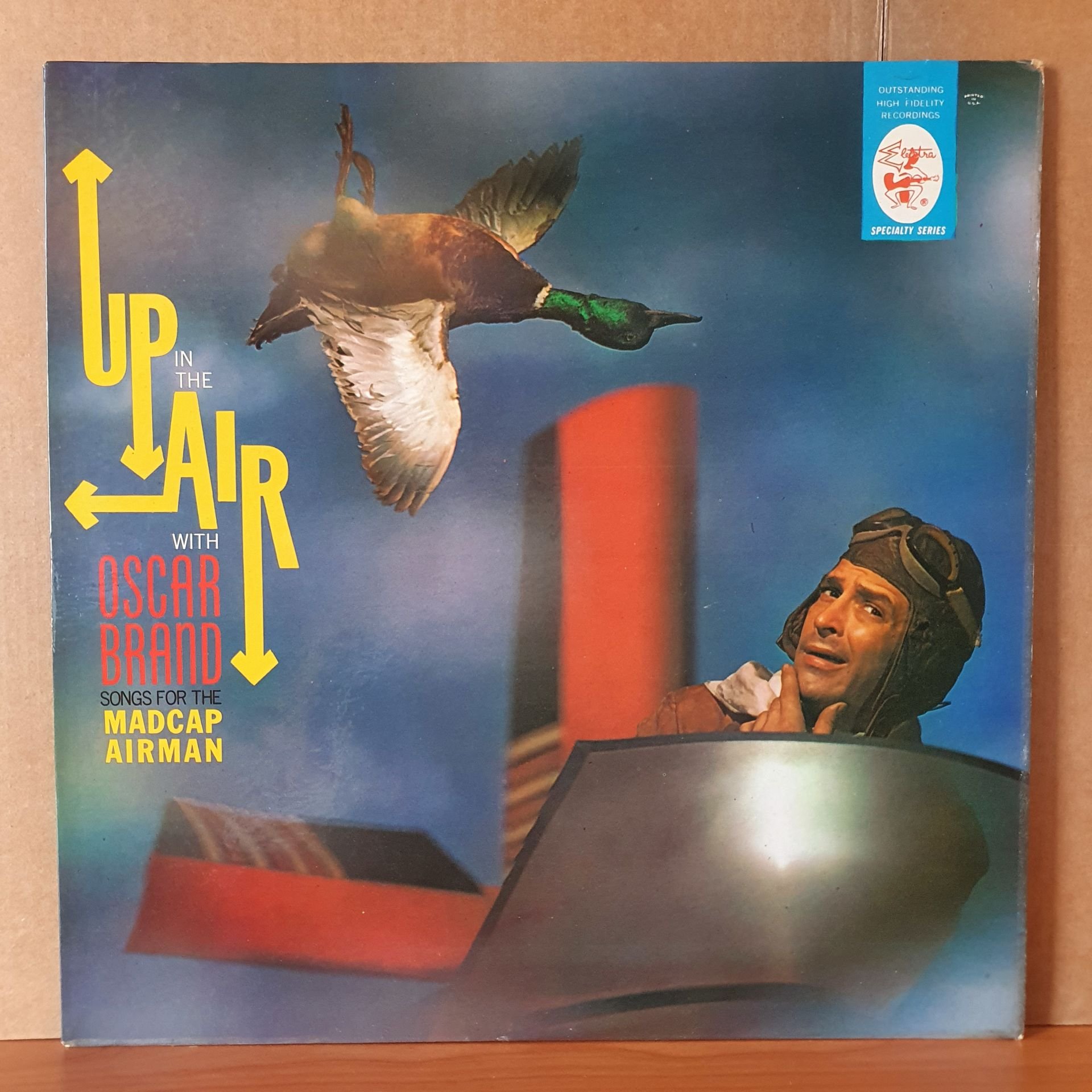 OSCAR BRAND - UP IN THE AIR / SONGS FOR THE MADCAP AIRMAN (1960) - LP 2.EL PLAK