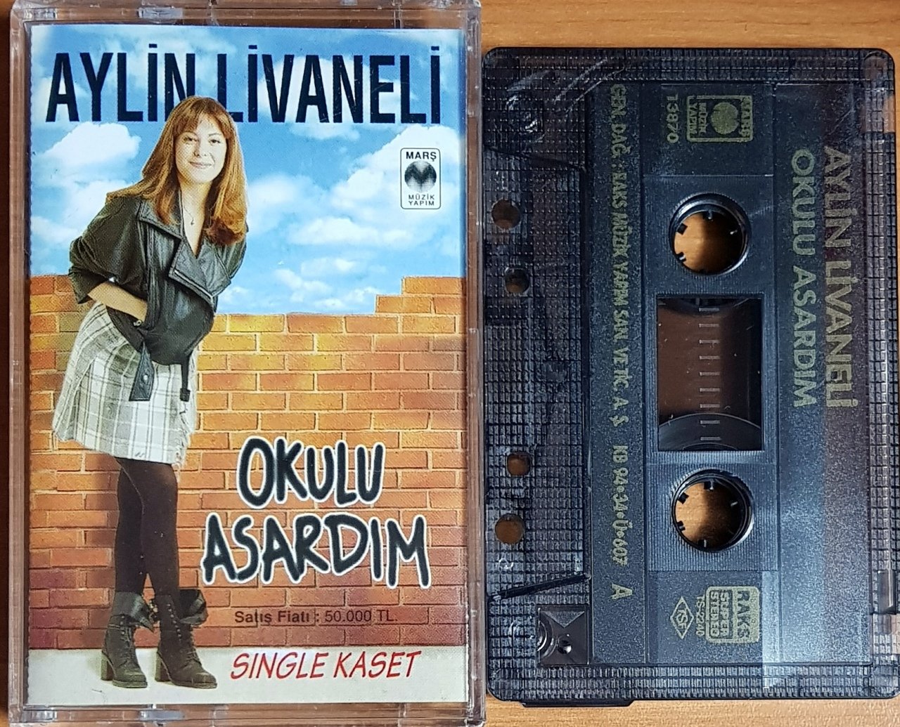 AYLİN LİVANELİ - OKULU ASARDIM (1994) MARŞ MÜZİK SINGLE KASET 2.EL