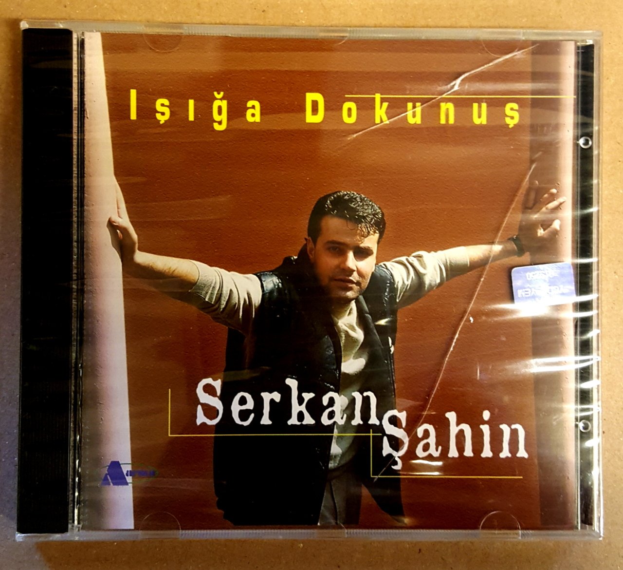 SERKAN ŞAHİN - IŞIĞA DUKUNUŞ (1999) - CD ESKİ METALİK BANDROL SIFIR