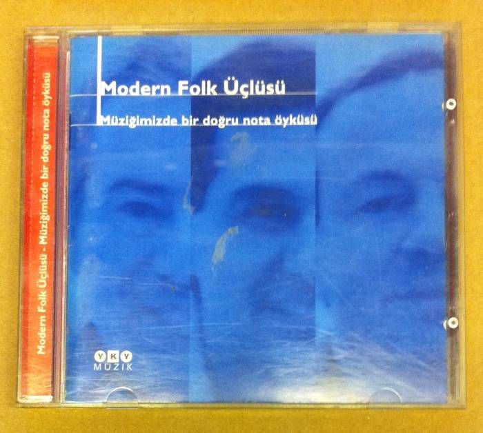 MODERN FOLK ÜÇLÜSÜ - MÜZİĞİMİZDE BİR DOĞRU NOTA ÖYKÜSÜ - CD YKY MÜZİK 2.EL