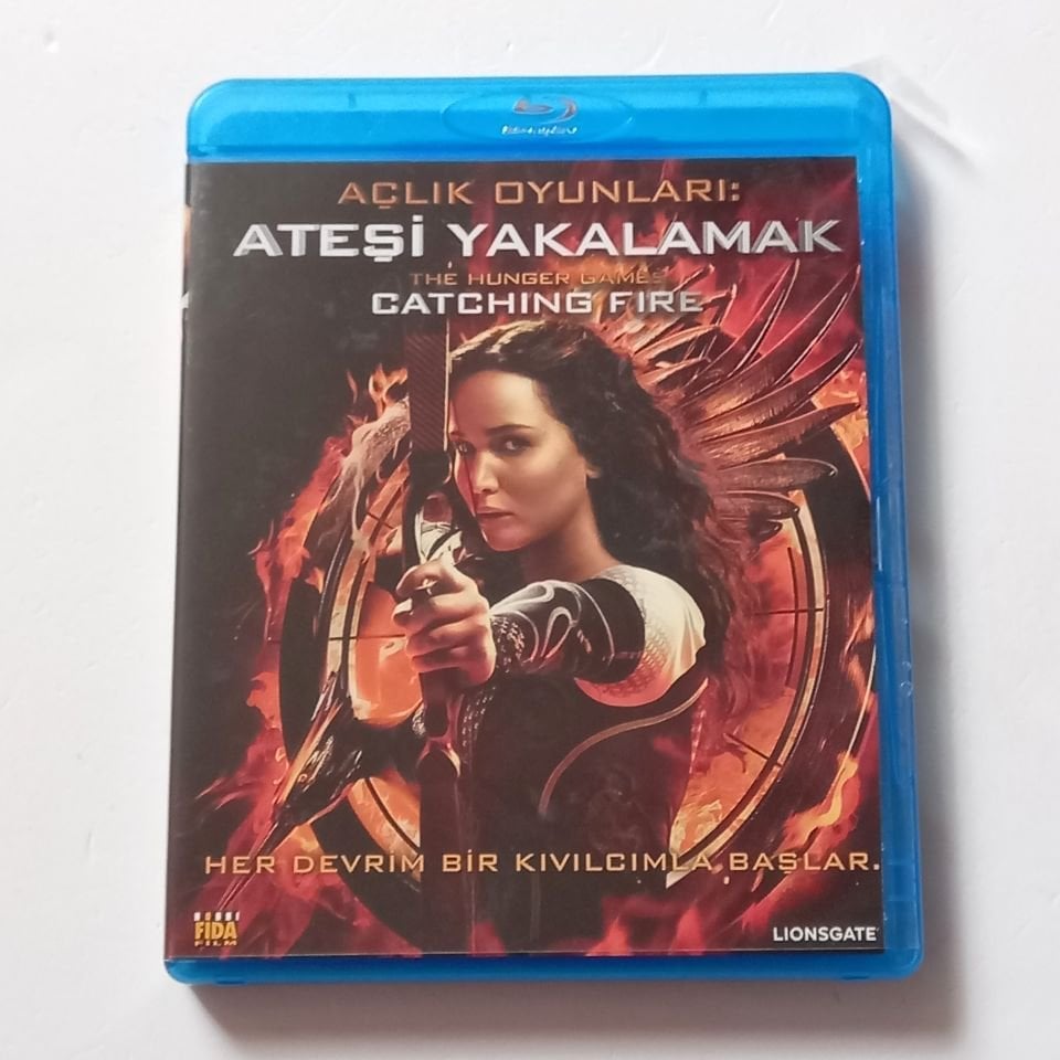 AÇLIK OYUNLARI: ATEŞİ YAKALAMAK / THE HUNGER GAMES CATCHING FIRE - JENNIFER LAWRENCE, JOSH HUTCHERSON, LIAM HEMSWORTH - YÖN.: FRANCIS LAWRENCE - BLU-RAY 2.EL
