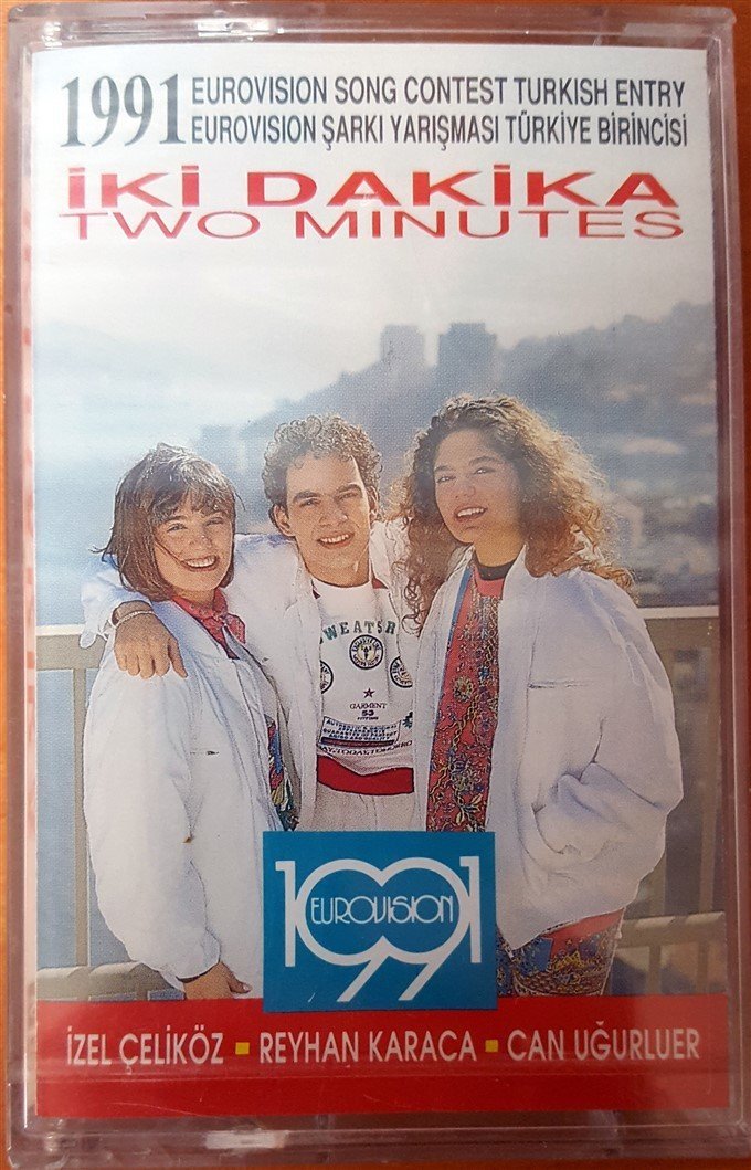 EUROVISION 1991 IZEL CELIKOZ REYHAN KARACA CAN UGURLUER - IKI DAKIKA / TWO MINUTES CASSETTE MADE IN TURKEY ''NEW''