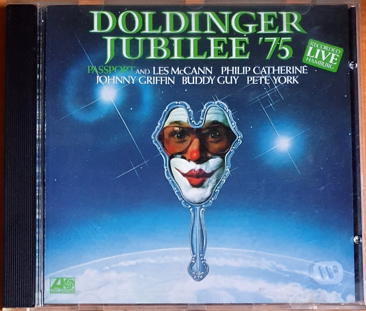 PASSPORT AND LES MCCANN, PHILIP CATHERINE, JOHNNY GRIFFIN, BUDDY GUY, PETE YORK - DOLDINGER JUBILEE '75 / RECORDED LIVE HAMBURG (1975) - CD 1990 WEA 2.EL