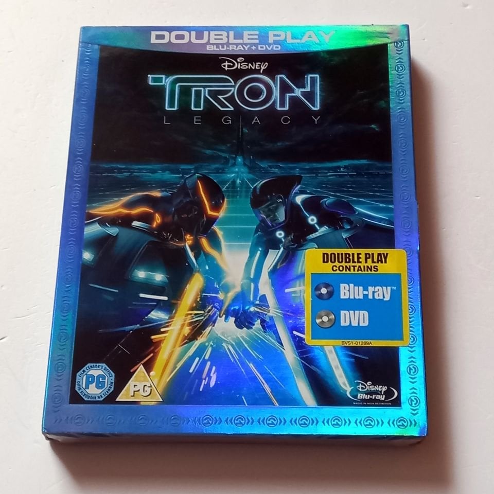 TRON: LEGACY - JEFF BRIDGES, GARRETT HEDLUND, OLIVIA WILDE - YÖN.: JOSEPH KOSINSKI - BLU-RAY + DVD EMBOSSED SLIPCOVER REGION FREE TÜRKÇE ALTYAZI YOKTUR SIFIR