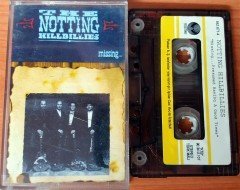 NOTTING HILLBILLIES - MISSING...PRESUMED HAVING A GOOD TIME (1990) PLAKSAN CASSETTE MADE IN TURKEY ''USED'' PAPER LABEL (PRODUCED BY MARK KNOPFLER)