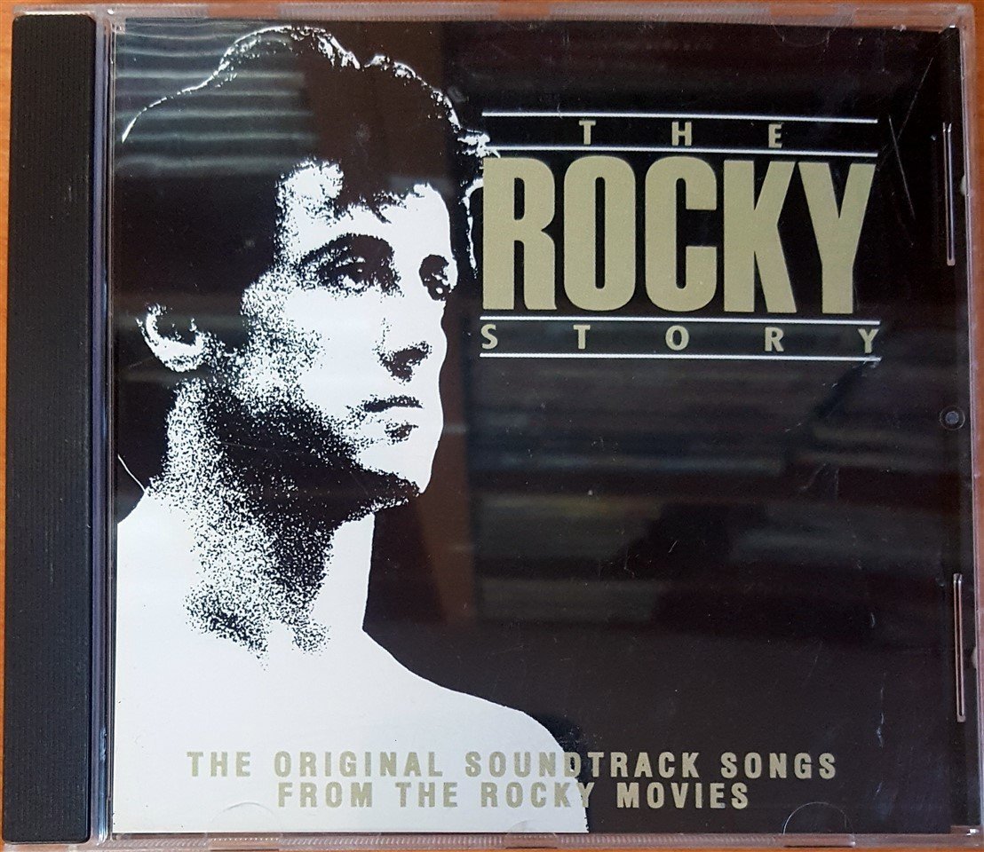 THE ROCKY STORY - THE ORIGINAL SOUNDTRACK SONGS FROM THE ROCKY MOVIES (1990) - CD 2.EL