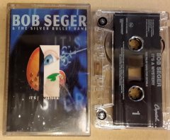 BOB SEGER & THE SILVER BULLET BAND -  IT'S A MYSTERY CASSETTE 1995 MADE IN HOLLAND ''USED''