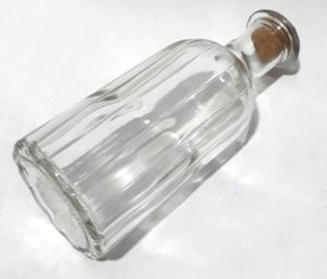 Kaliteli Sağlam Camdan Üretim 19x7,5x7,5cm Boyutunda Kıvrımlı Şişe