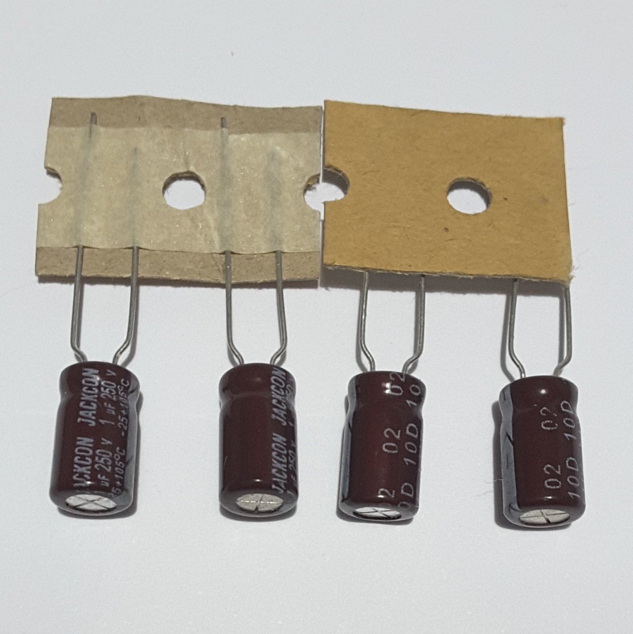 1uF 250V Elektrolitik Kondansatör 6*11 , Şerit , 105C -- (25 ADETLİK PAKET )