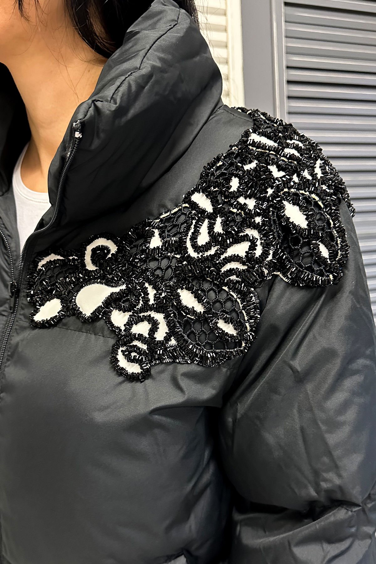 Bead Embroidered Black Down Jacket on White Leather