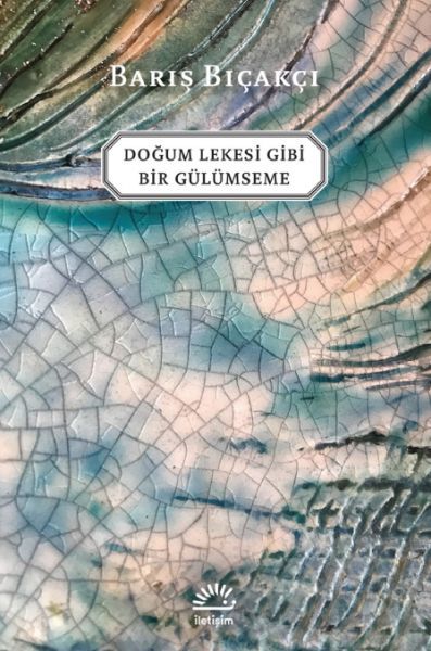 Doğum Lekesi Gibi Bir Gülümseme BARIŞ BIÇAKÇI