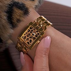 GUESS GUGW0807L2 ALTIN KAPLAMA LEOPAR KADRAN DİKDÖRTGEN KADIN KOL SAATİ