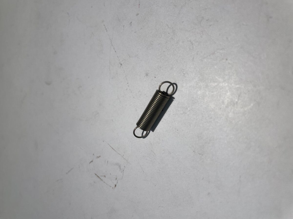 555248-001 SPRING,PUSH-PUSH, LATCH
