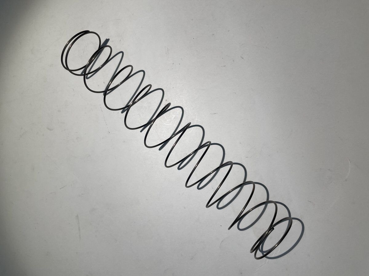 578077-011 SPRING,COMPRESSION