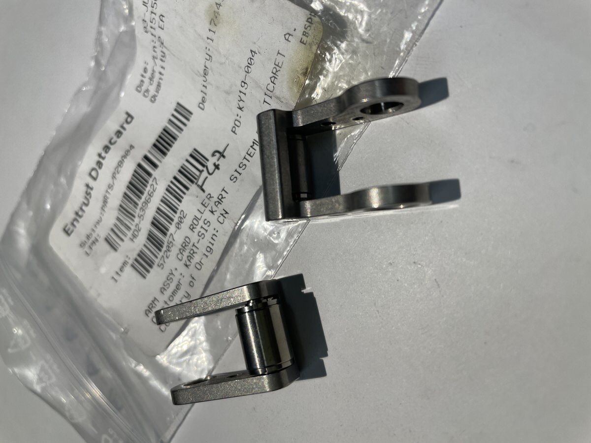 572057-002 ARM ASSY, CARD ROLLER