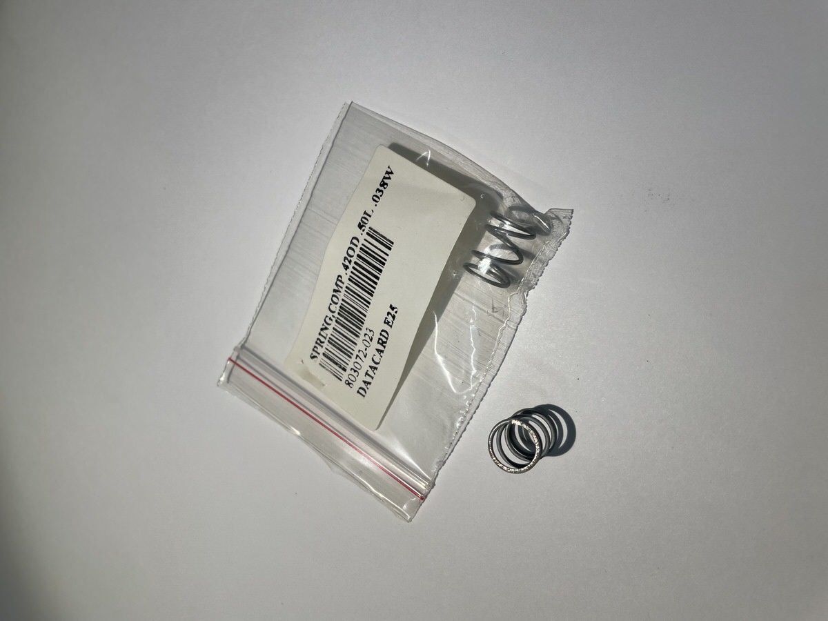 803072-023 SPRING,COMP .42OD .50L .038W