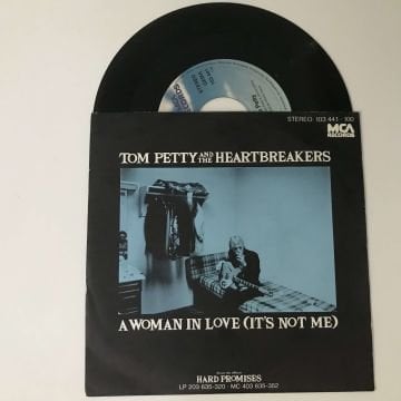 Tom Petty And The Heartbreakers – A Woman In Love (It's Not Me)