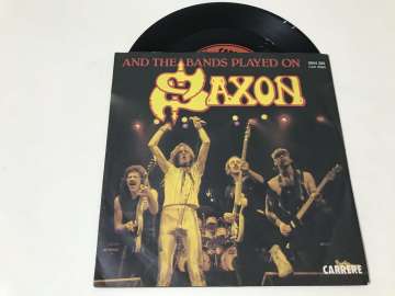 Saxon – And The Bands Played On