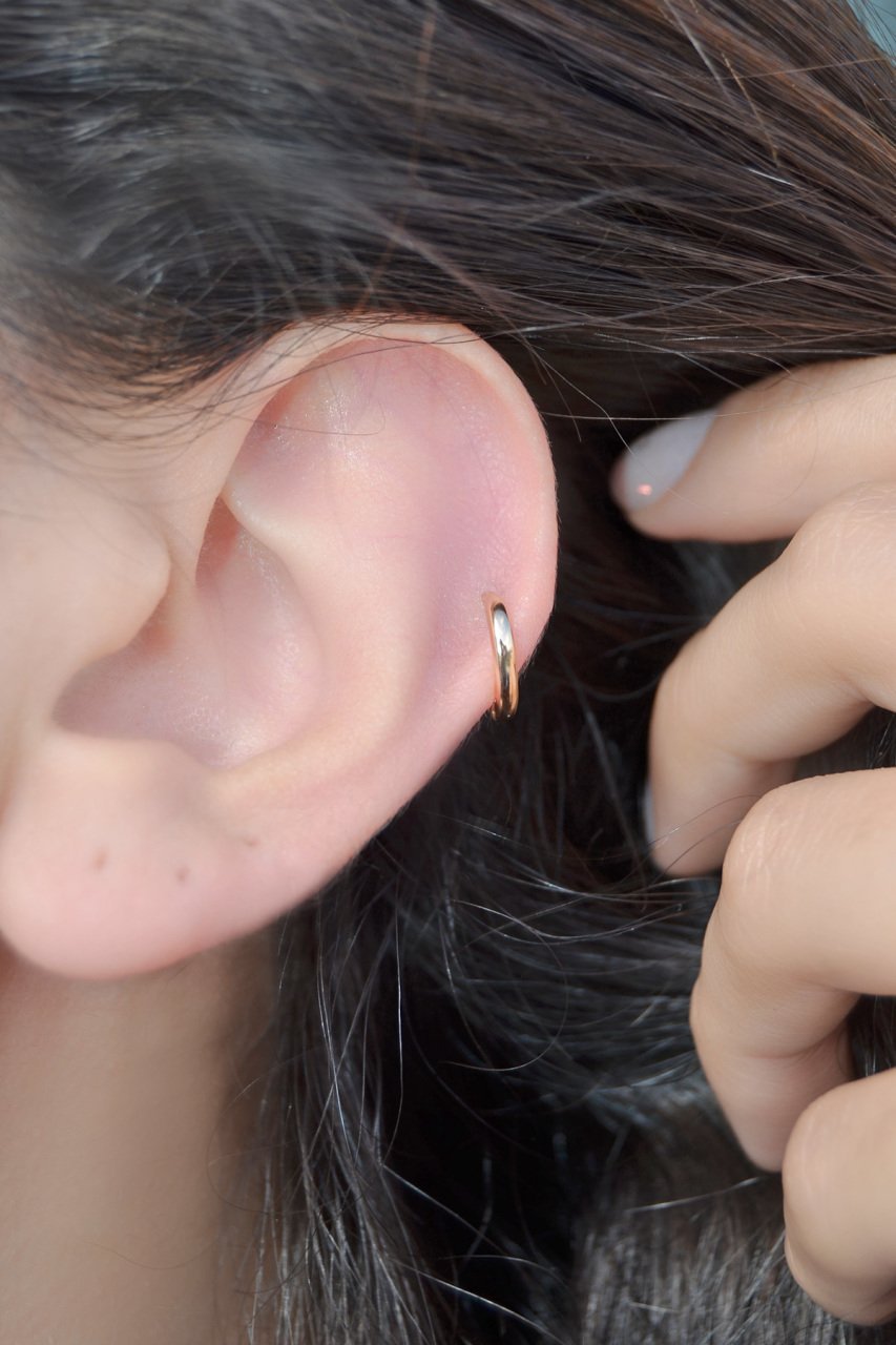 Tragus piercing shop gold