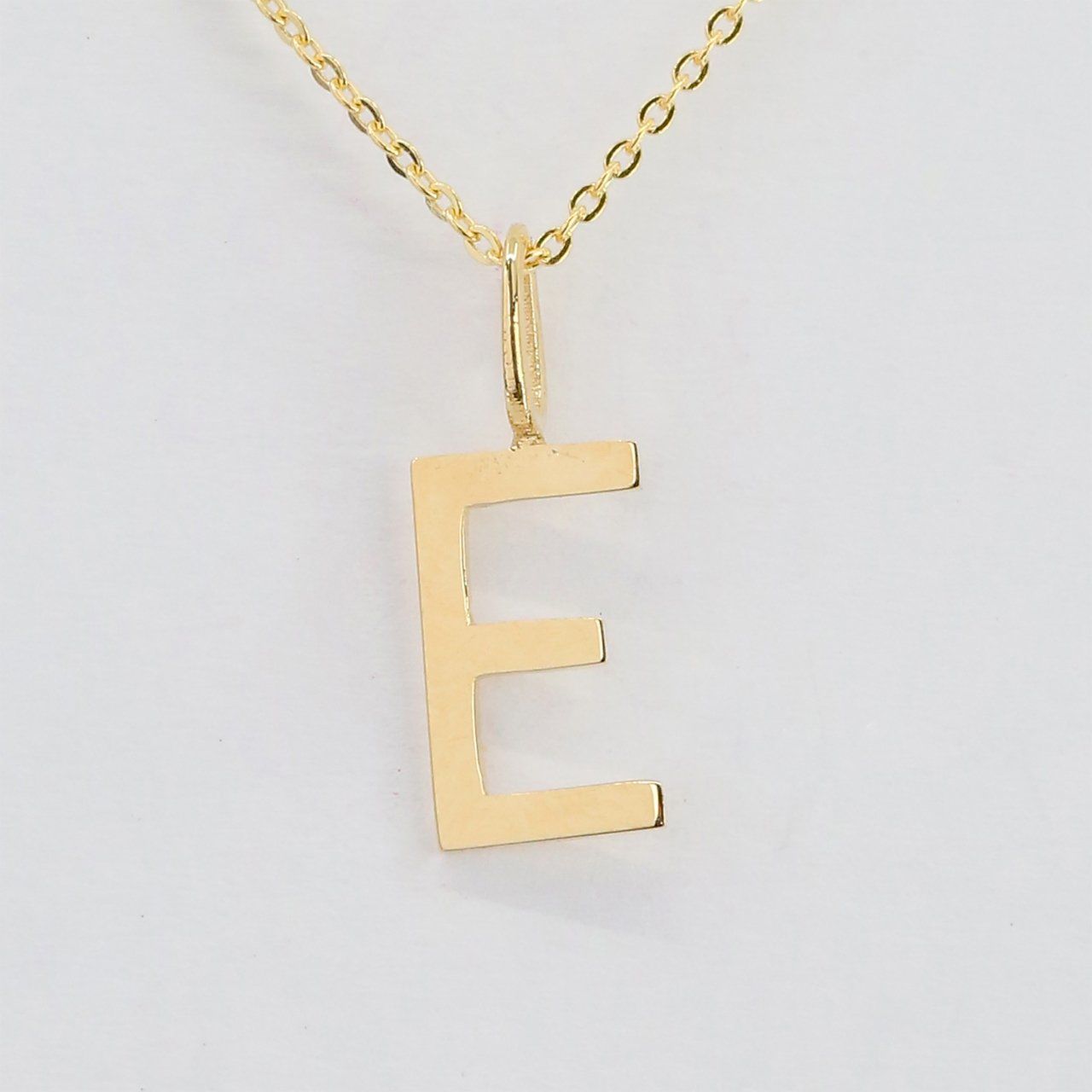Letter e pendant deals