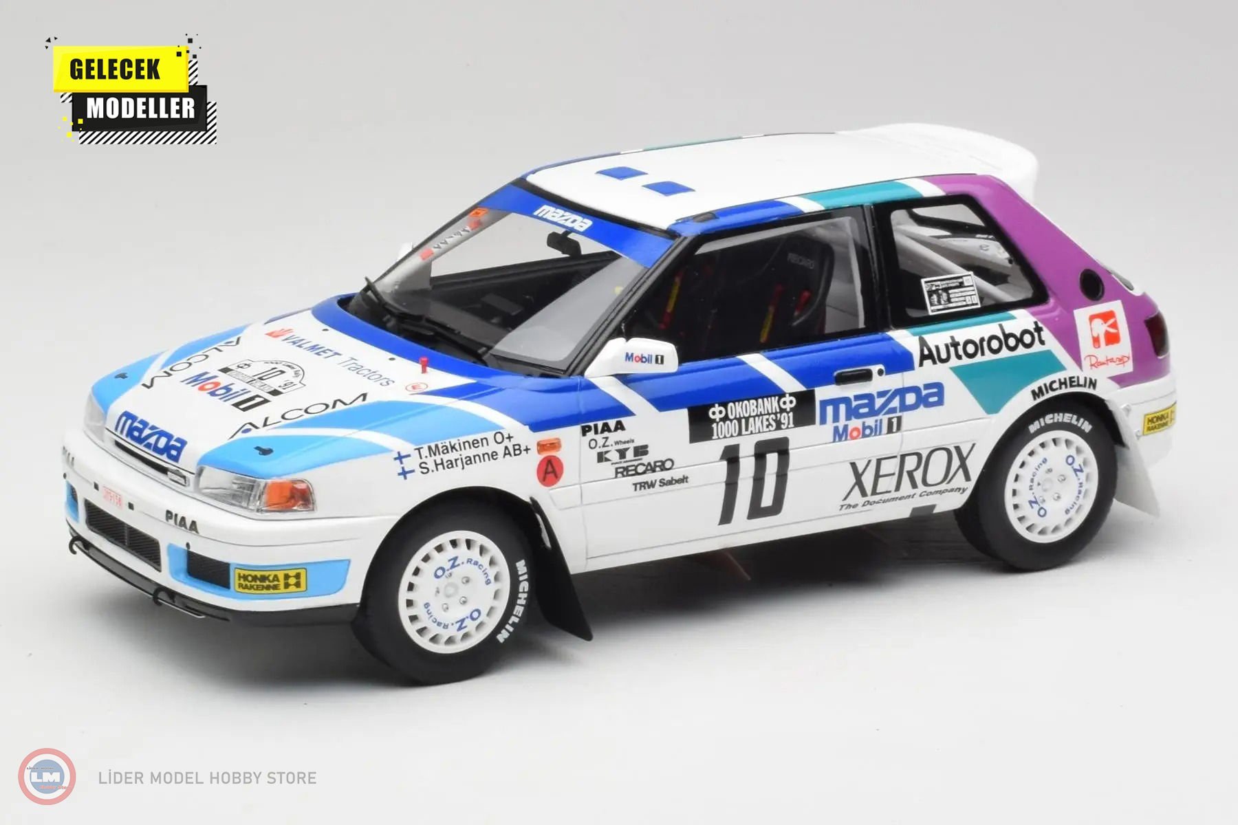 Otto Mobile - 1:18 OTTO Mazda 323 GTX #10 GrA 1000 Lakes Rally 1991 - 5 ...