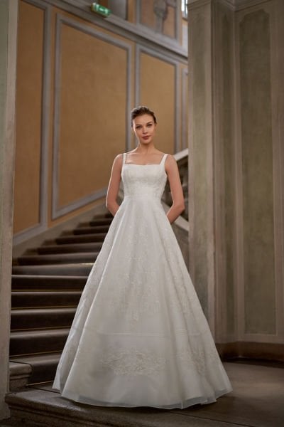 Box Neck, Thin Straps, Cage Form, Embroidered Italian Organza Fabric, Grid Effect, Voluminous Skirt, Waist Belt Detail, Ecru Color, Round Back Neckline Wedding Dress Model