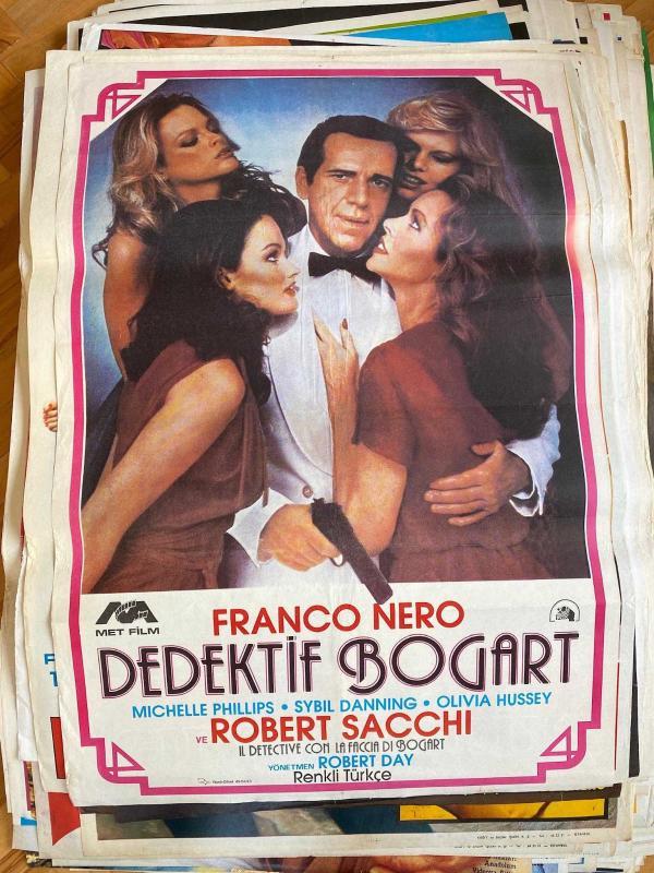 DEDEKTİF BOGART FİLMİNİN AFİŞİ OYNAYANLAR: FRANCO NERO, ROBERT SACCHI, MICHELLE PHILLIPS, SYBIL DANNING, OLIVIA HUSSEY YÖNETMEN: ROBERT DAY