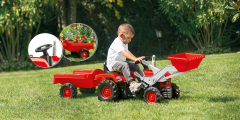 Traktor mit vollem Anhänger und Schaufelpedal Rot