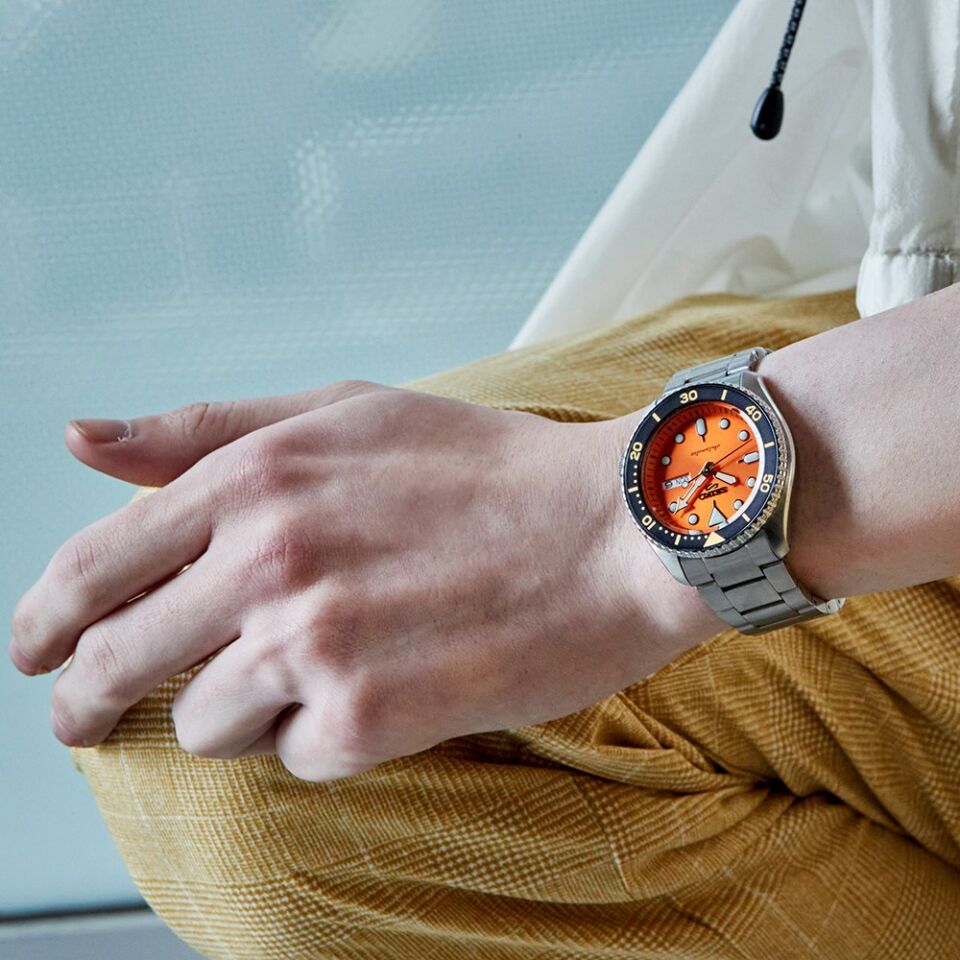 Seiko SRPD59K1 Otomatik Çelik Gri Turuncu Kadran Hardlex Cam 10 ATM 42 mm Erkek Kol Saati