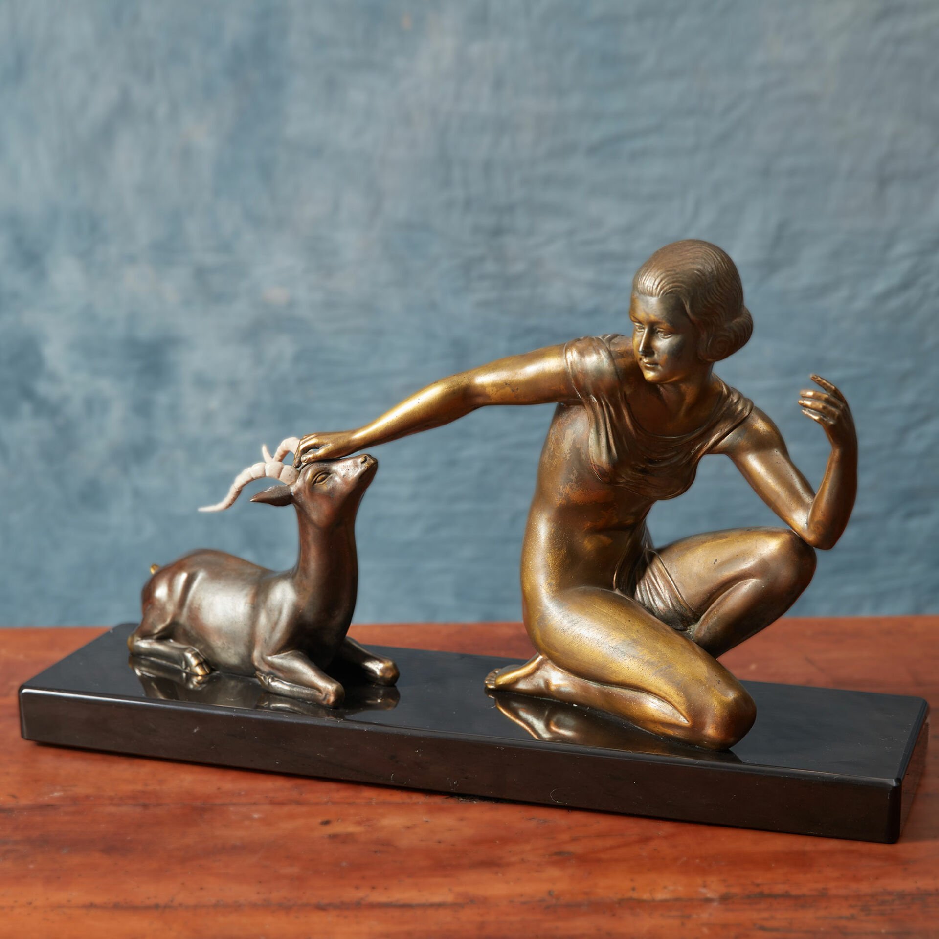 Goat and Woman Sculpture