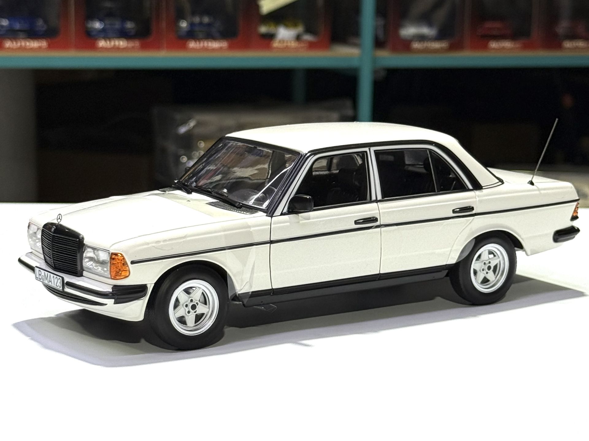 1:18 Mercedes-Benz 200 W123 with AMG Spoiler White 1980 - Norev