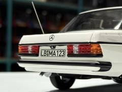 1:18 Mercedes-Benz 200 W123 with AMG Spoiler White 1980 - Norev