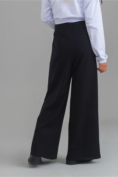 Kadın Siyah Renk Viskon Polyester Likralı Cepli Bol Paça Beli Lastikli Pantolon Siyah - XL