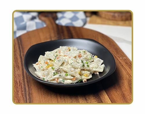 Triangle Ravioli with Creamy Vegetables